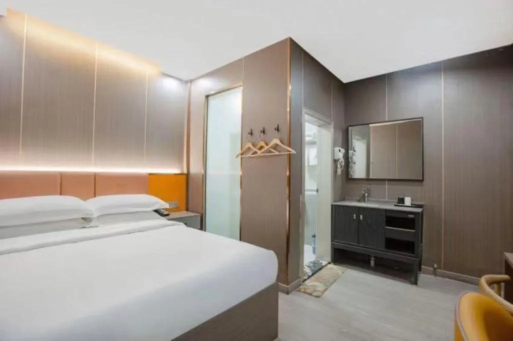 Bed in Shell Hotel Nanyang High-Speed Railway Station Jiangying Airport Huayaocheng