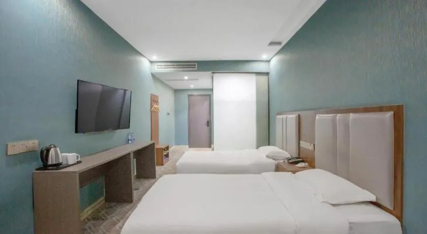 Bed in Shell Hotel Nanyang High-Speed Railway Station Jiangying Airport Huayaocheng