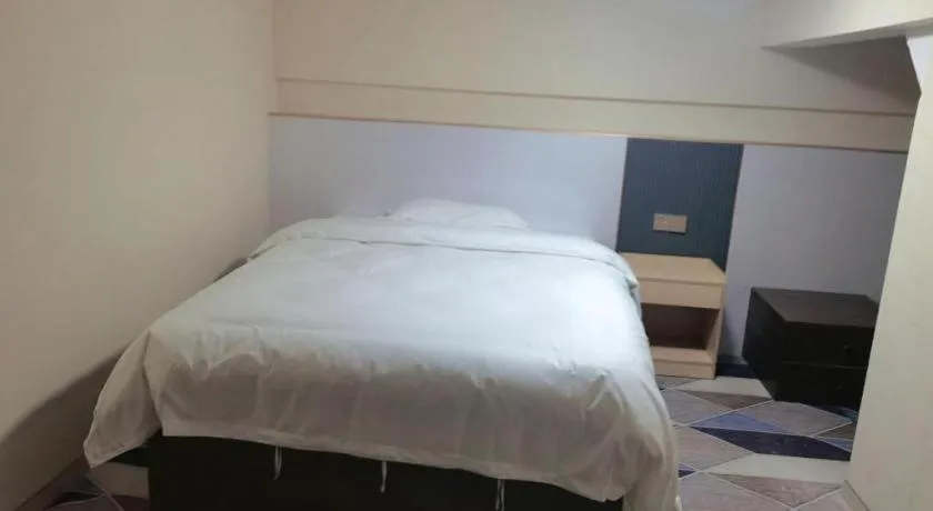 Bed in Shell Hotel Nanyang High-Speed Railway Station Jiangying Airport Huayaocheng