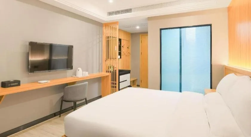 Bed in Shell Hotel Nanyang High-Speed Railway Station Jiangying Airport Huayaocheng
