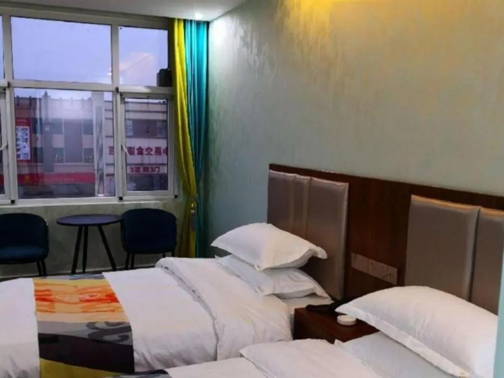 Bed in Shell Hotel Nanyang High-Speed Railway Station Jiangying Airport Huayaocheng