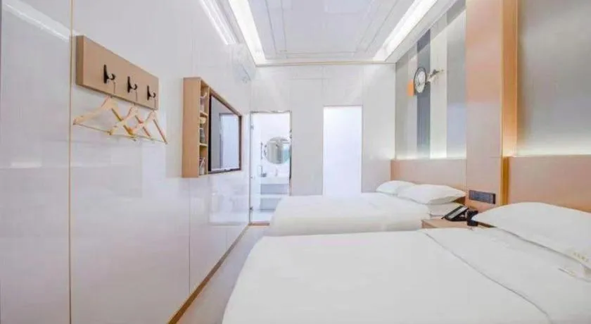 Bed in Shell Hotel Nanyang High-Speed Railway Station Jiangying Airport Huayaocheng
