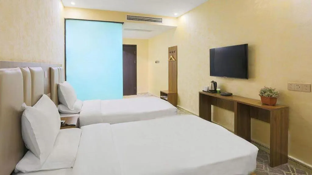 Bed in Shell Hotel Nanyang High-Speed Railway Station Jiangying Airport Huayaocheng