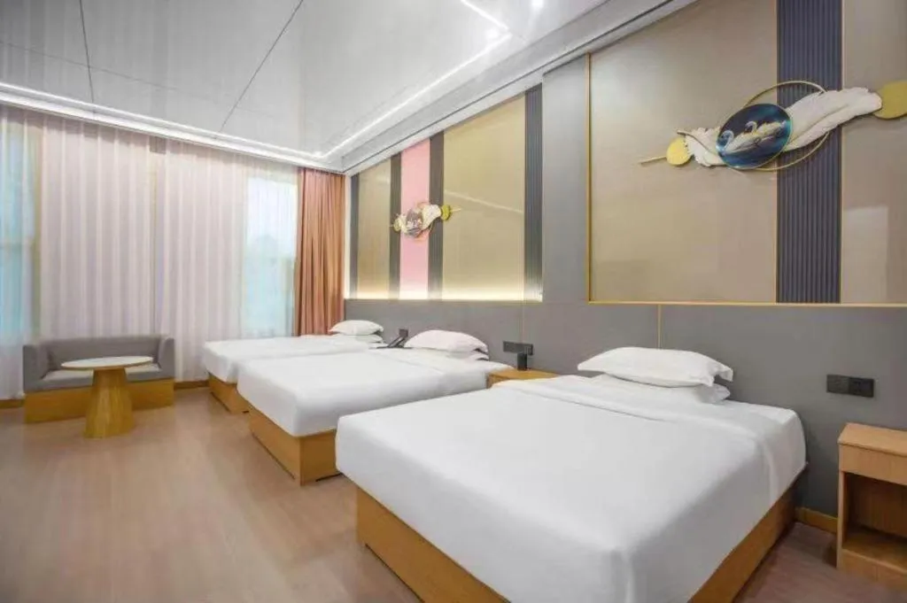 Bed in Shell Hotel Nanyang High-Speed Railway Station Jiangying Airport Huayaocheng