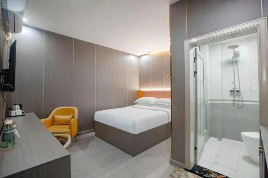 Bed in Shell Hotel Nanyang High-Speed Railway Station Jiangying Airport Huayaocheng