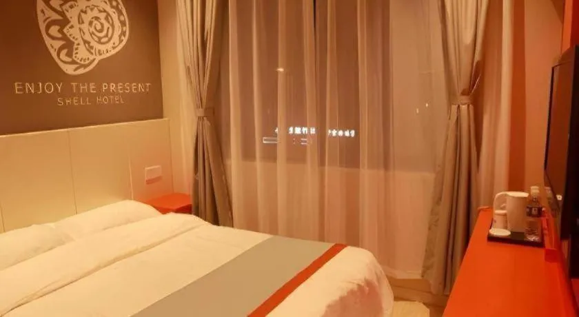 Bed in Shell Hotel Hebi Qi County Qihe Road