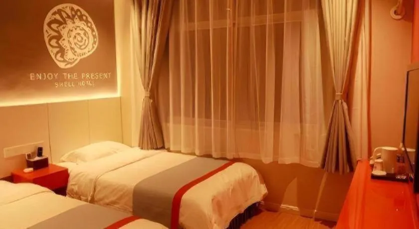 Bed in Shell Hotel Hebi Qi County Qihe Road