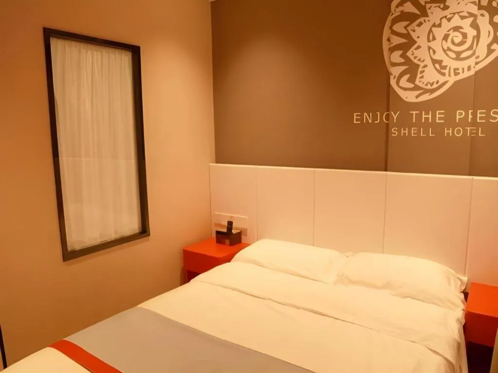 Bed in Shell Hotel Hebi Qi County Qihe Road