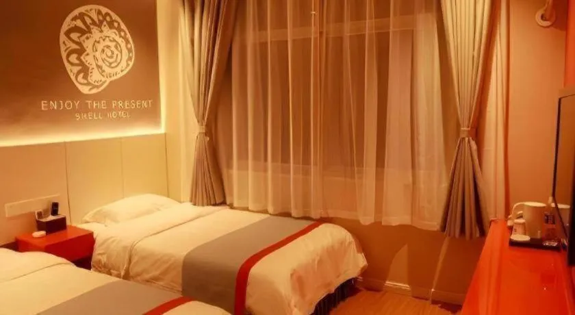 Bed in Shell Hotel Hebi Qi County Qihe Road