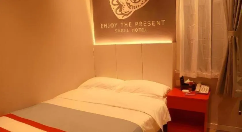 Bed in Shell Hotel Hebi Qi County Qihe Road