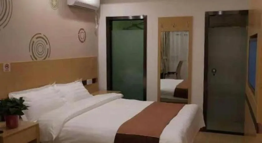 Bed in Shell Hotel Beijing Fangshan District Chengguan Metro Station