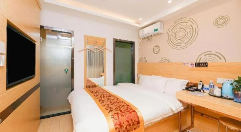 Bed in Shell Hotel Beijing Fangshan District Chengguan Metro Station