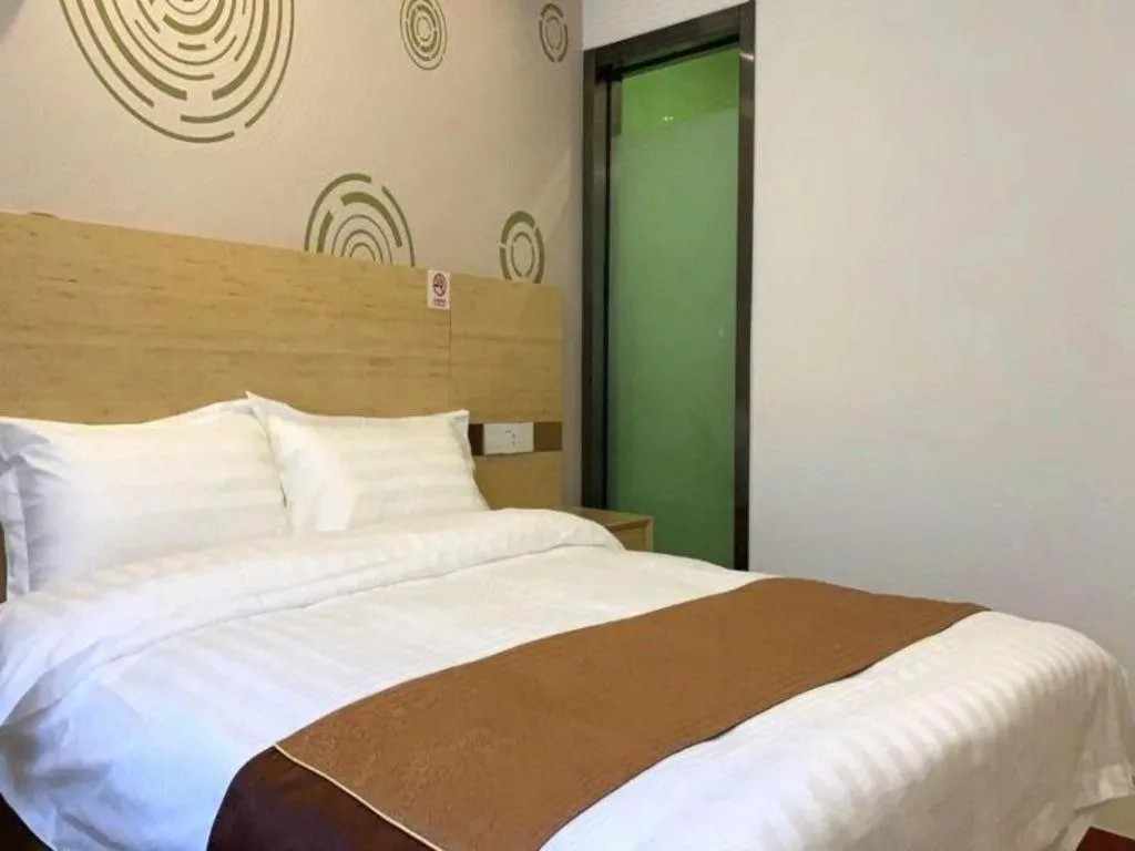 Bed in Shell Hotel Beijing Fangshan District Chengguan Metro Station