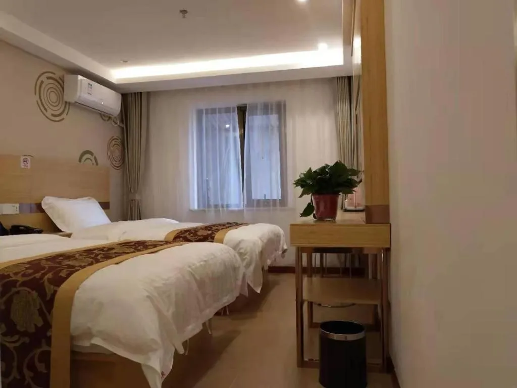 Bed in Shell Hotel Beijing Fangshan District Chengguan Metro Station