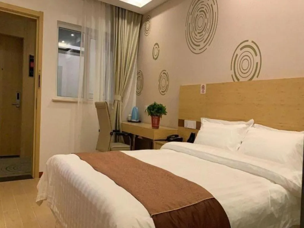 Bed in Shell Hotel Beijing Fangshan District Chengguan Metro Station