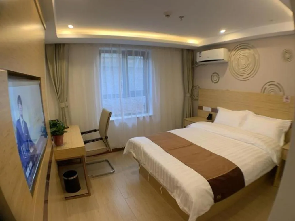 Bed in Shell Hotel Beijing Fangshan District Chengguan Metro Station