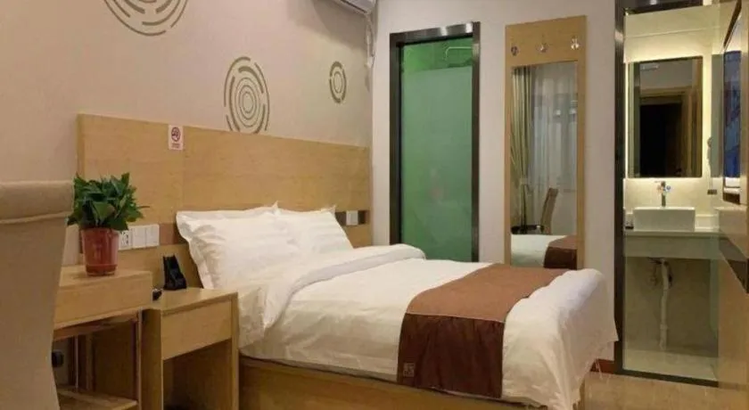 Bed in Shell Hotel Beijing Fangshan District Chengguan Metro Station