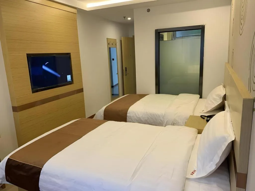 Bed in Shell Hotel Beijing Fangshan District Chengguan Metro Station