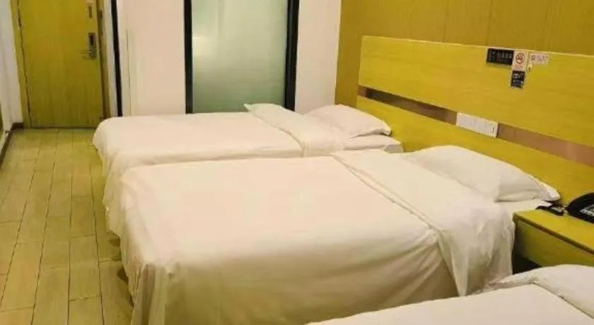 Bed in Shell Hotel Beijing Fangshan District Chengguan Metro Station
