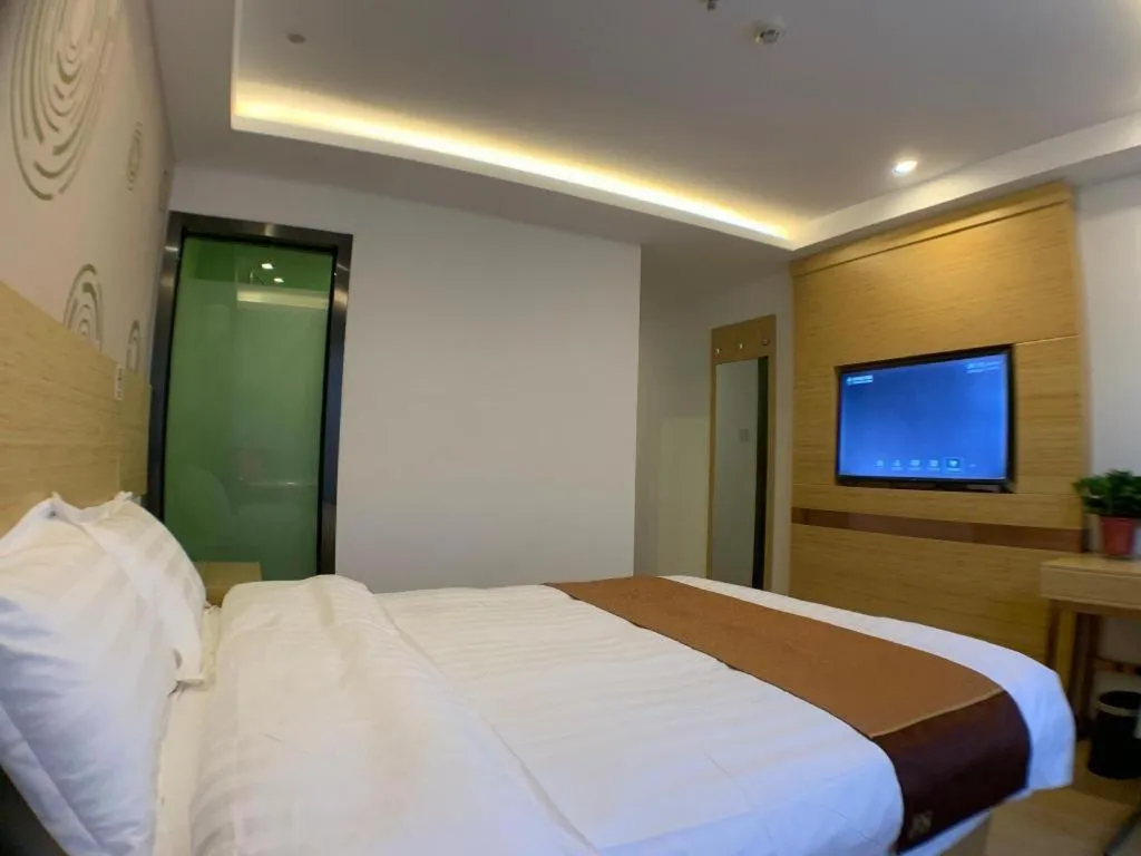 Bed in Shell Hotel Beijing Fangshan District Chengguan Metro Station