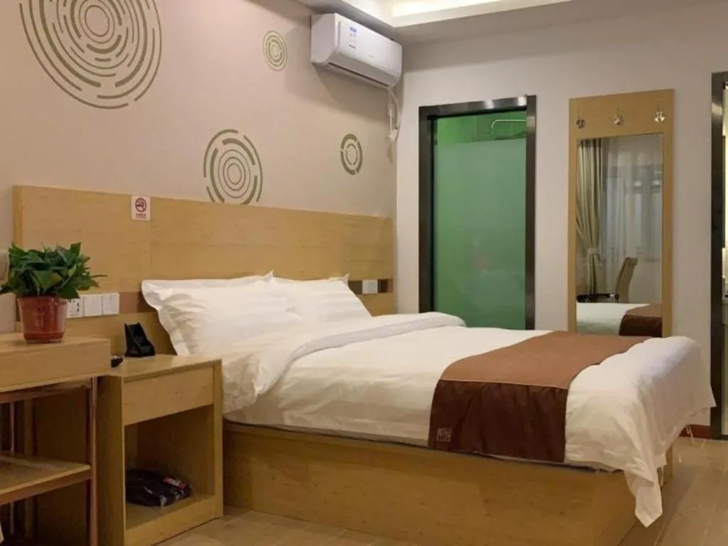 Bed in Shell Hotel Beijing Fangshan District Chengguan Metro Station