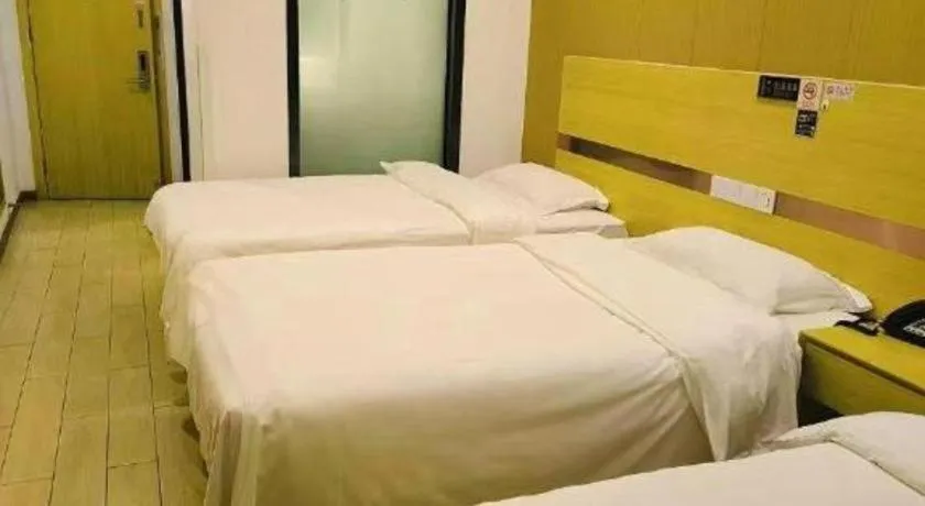 Bed in Shell Hotel Beijing Fangshan District Chengguan Metro Station