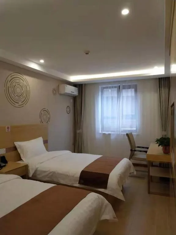 Bed in Shell Hotel Beijing Fangshan District Chengguan Metro Station