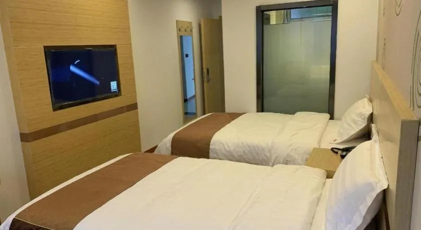 Bed in Shell Hotel Beijing Fangshan District Chengguan Metro Station