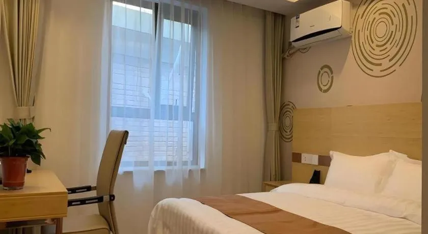 Bed in Shell Hotel Beijing Fangshan District Chengguan Metro Station