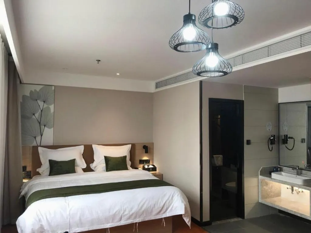 Bed in GreenTree Inn Tangshan Nanhu International Exhibition Center