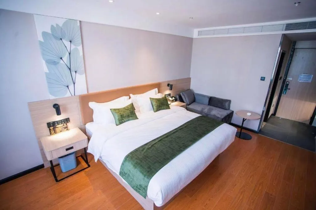 Bed in GreenTree Inn Tangshan Nanhu International Exhibition Center