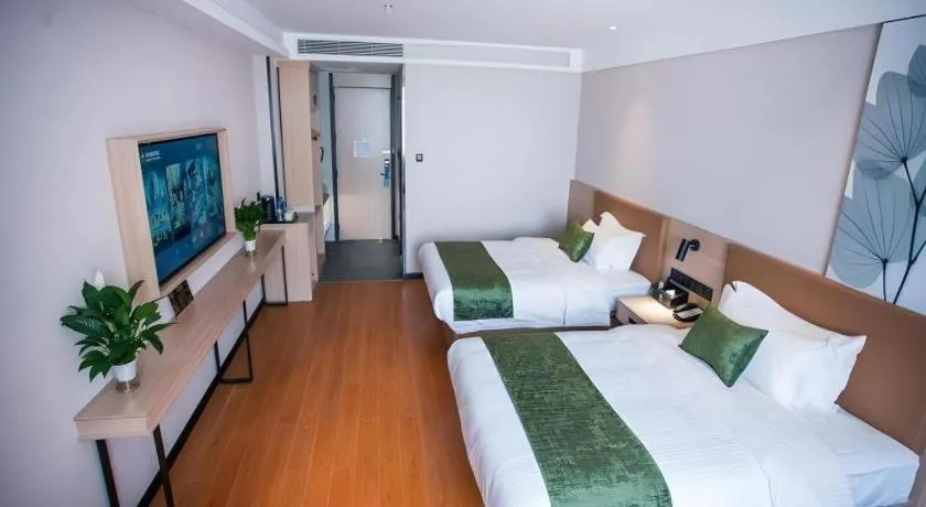 Bed in GreenTree Inn Tangshan Nanhu International Exhibition Center