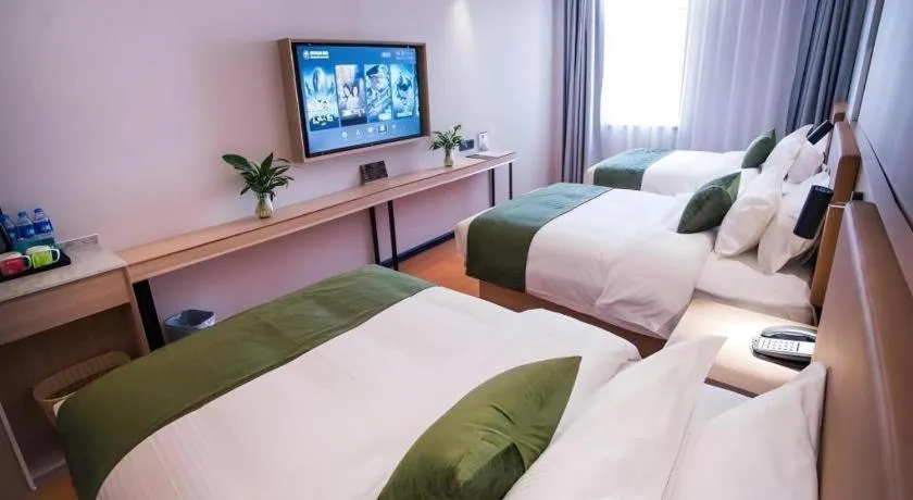 Bed in GreenTree Inn Tangshan Nanhu International Exhibition Center