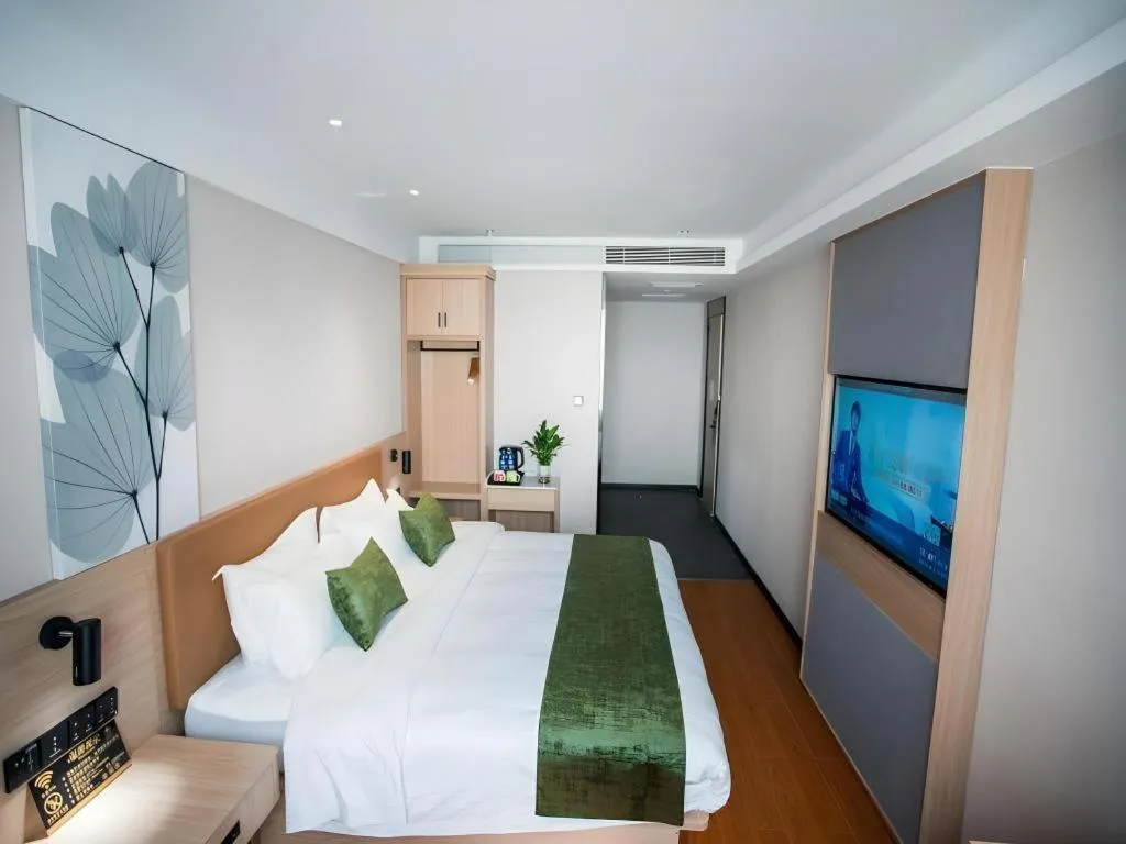 Bed in GreenTree Inn Tangshan Nanhu International Exhibition Center