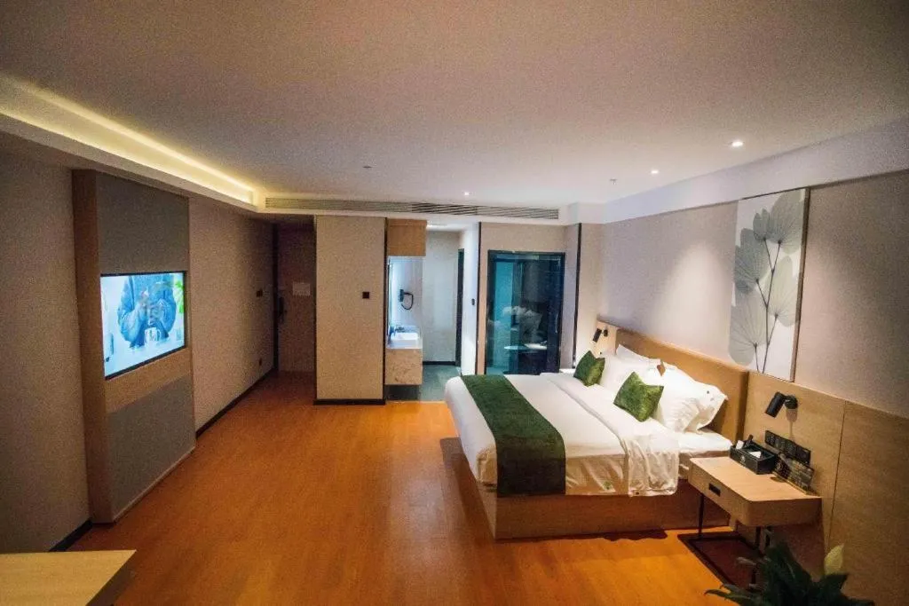 Bed in GreenTree Inn Tangshan Nanhu International Exhibition Center