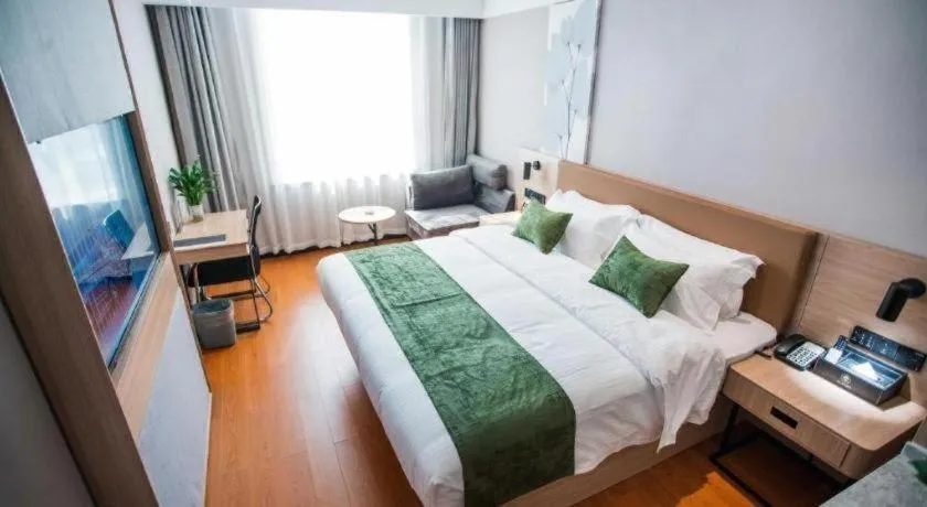 Bed in GreenTree Inn Tangshan Nanhu International Exhibition Center