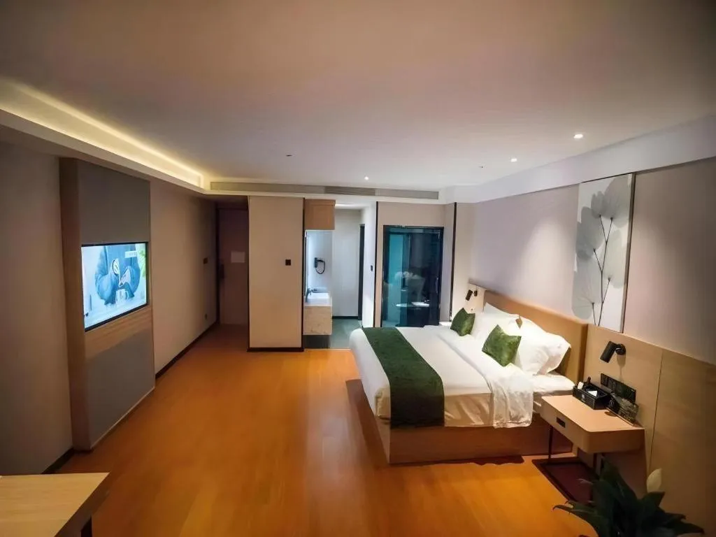 Bed in GreenTree Inn Tangshan Nanhu International Exhibition Center