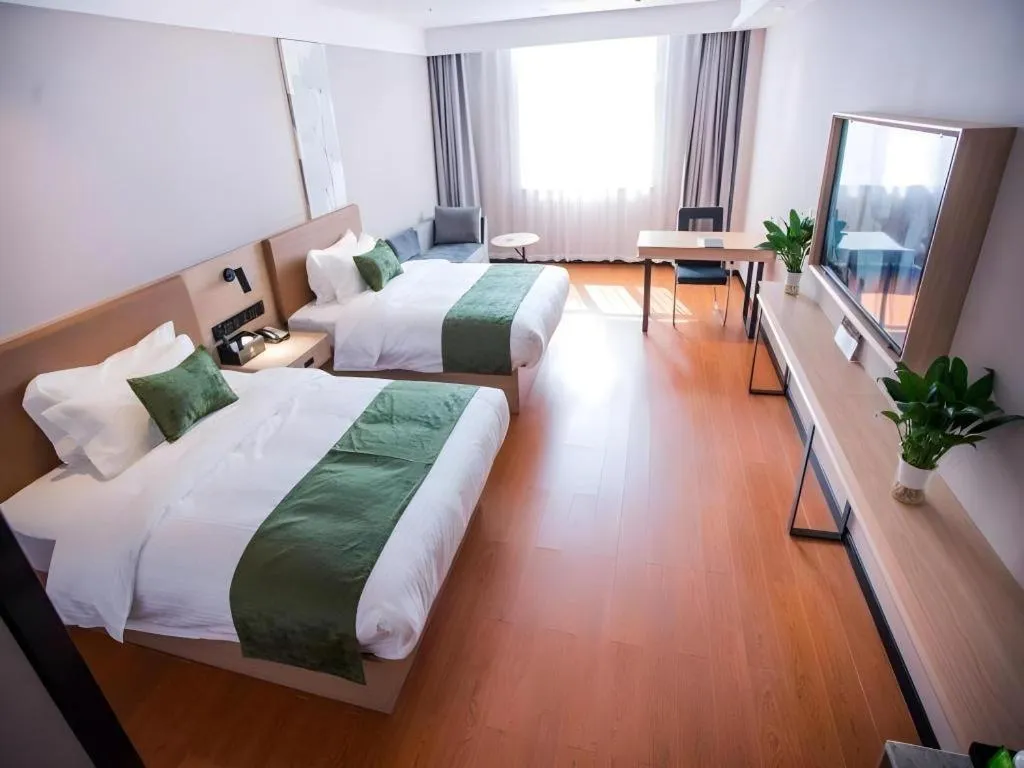 Bed in GreenTree Inn Tangshan Nanhu International Exhibition Center