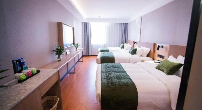 Bed in GreenTree Inn Tangshan Nanhu International Exhibition Center
