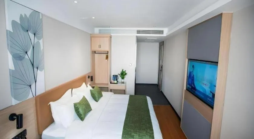 Bed in GreenTree Inn Tangshan Nanhu International Exhibition Center