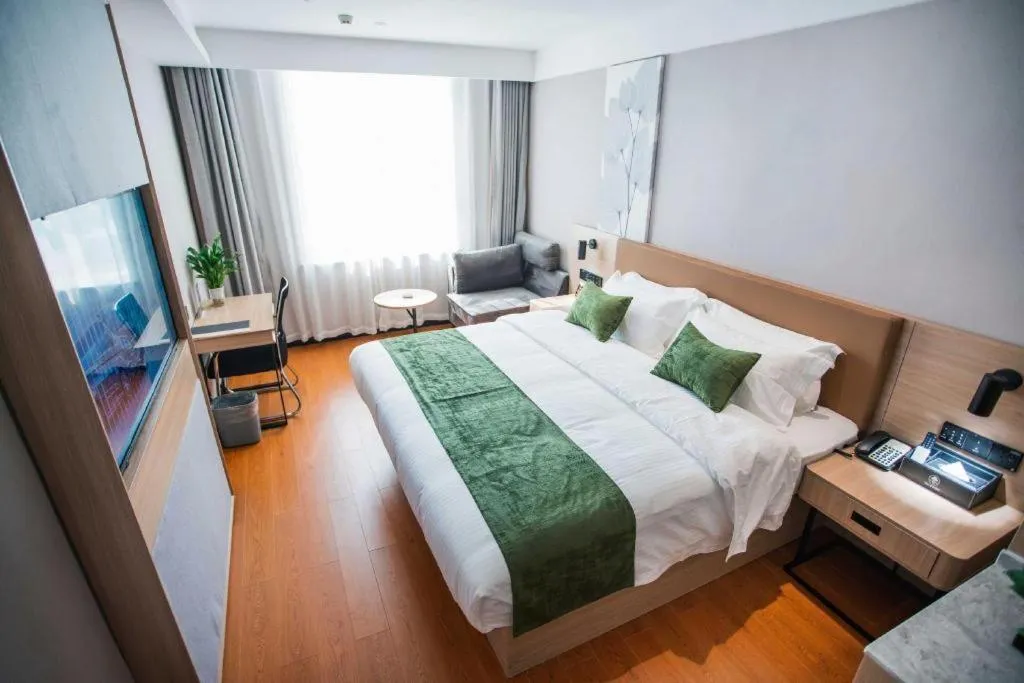 Bed in GreenTree Inn Tangshan Nanhu International Exhibition Center