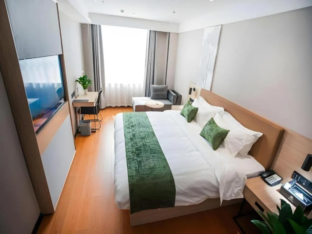 Bed in GreenTree Inn Tangshan Nanhu International Exhibition Center
