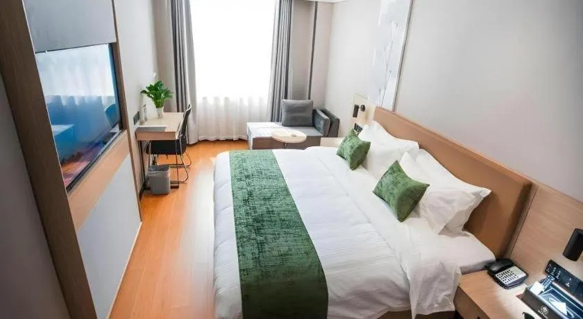 Bed in GreenTree Inn Tangshan Nanhu International Exhibition Center