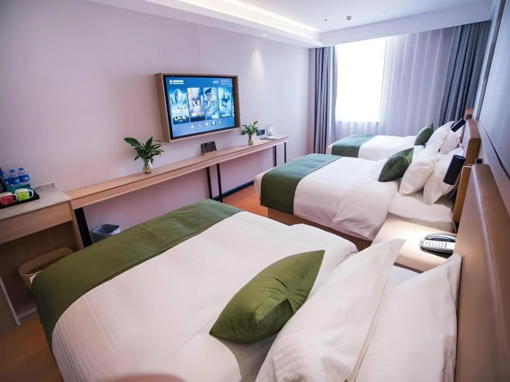 Bed in GreenTree Inn Tangshan Nanhu International Exhibition Center