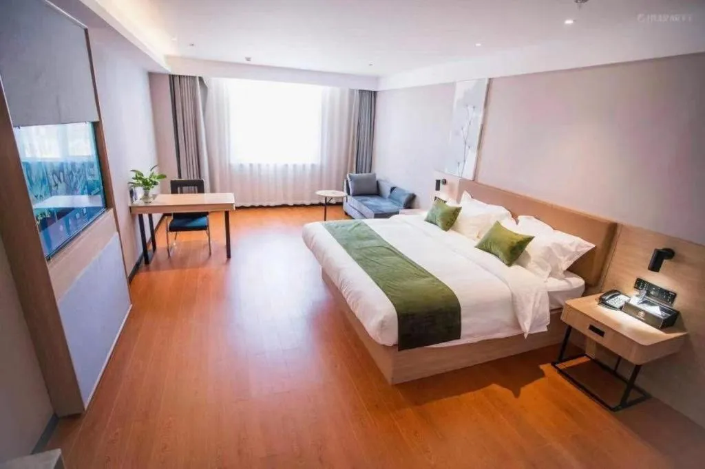 Bed in GreenTree Inn Tangshan Nanhu International Exhibition Center