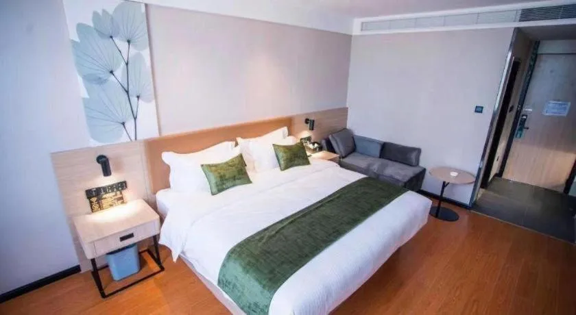 Bed in GreenTree Inn Tangshan Nanhu International Exhibition Center