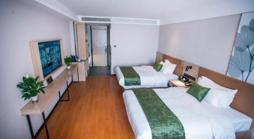 Bed in GreenTree Inn Tangshan Nanhu International Exhibition Center