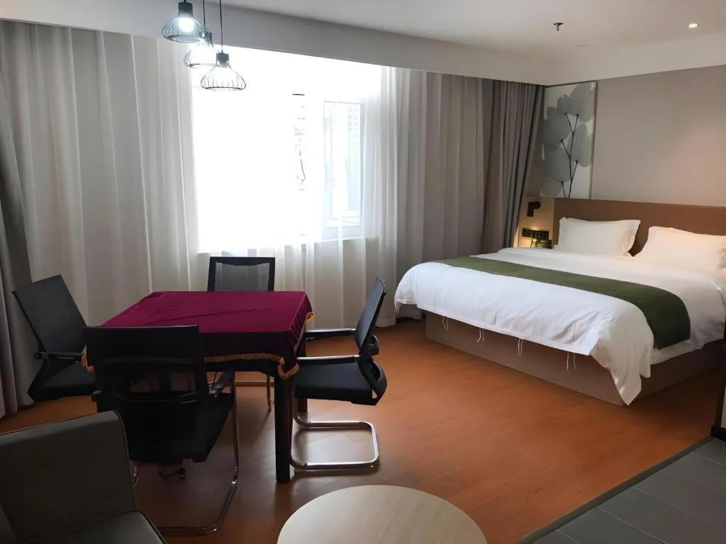 Bed in GreenTree Inn Tangshan Nanhu International Exhibition Center