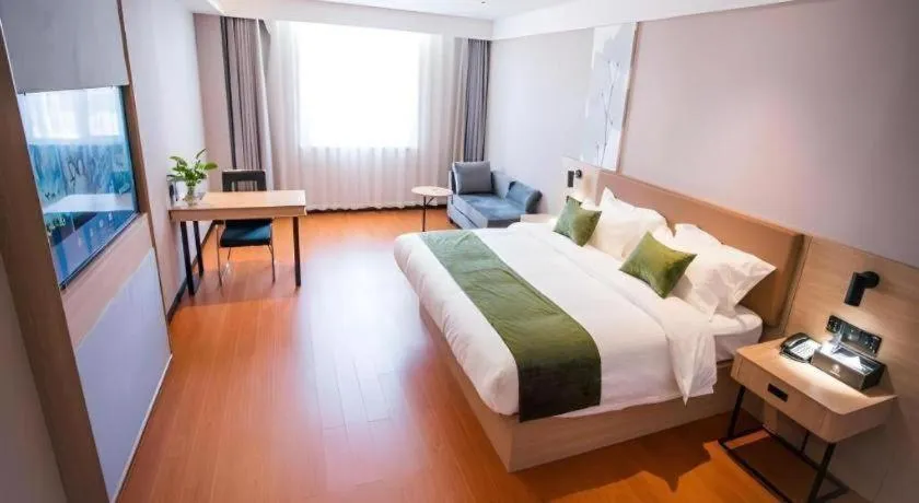 Bed in GreenTree Inn Tangshan Nanhu International Exhibition Center