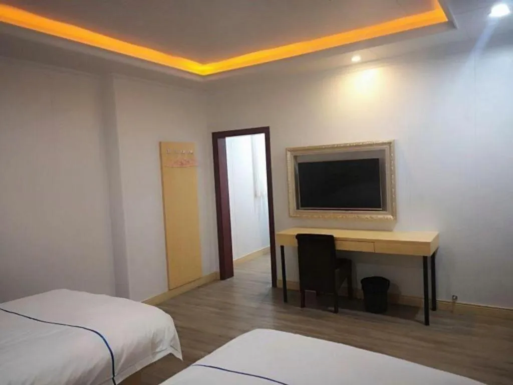 Bed in GreenTree Inn Express Shanghai Baoshan District Youyi Road Metro Station